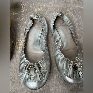 Silver Tory Burch ballet flats with tassel